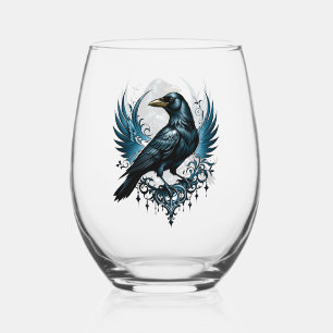 Majestic black raven sitting on an ornate stemless wine glass