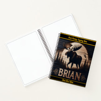 Majestic moose standing under a moonlit sky notebook
