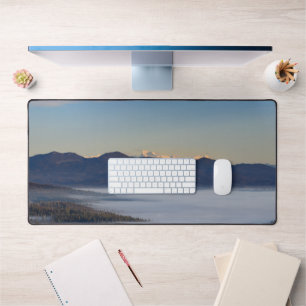 Majestic mountain Triglav with fog in valley Desk Mat
