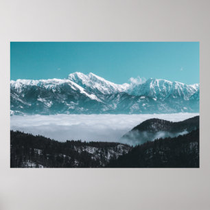 Majestic mountains rising over foggy valley poster