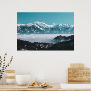 Majestic mountains rising over foggy valley poster