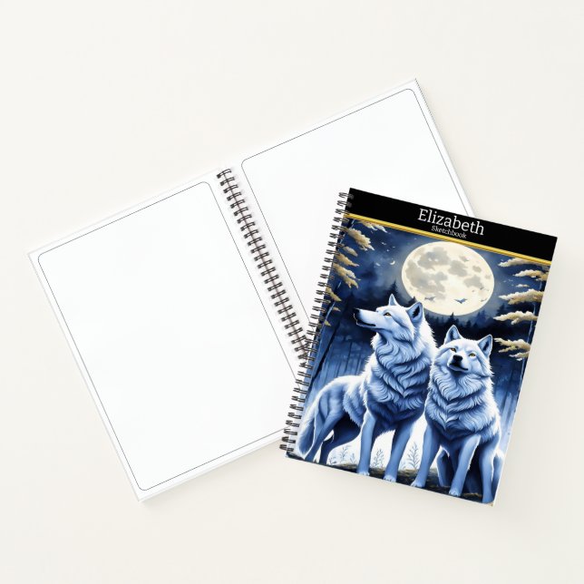 Majestic wolves howling under a luminous moonlight notebook (Inside)