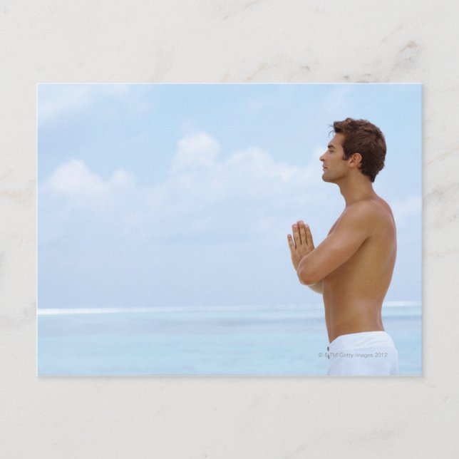Maldives, Smart young guy practicing yoga at Postcard (Front)