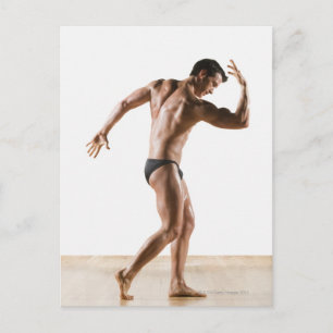 Male body builder flexing and posing 2 postcard