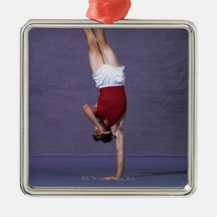 Male gymnast performing on the floor exercise 2 metal ornament