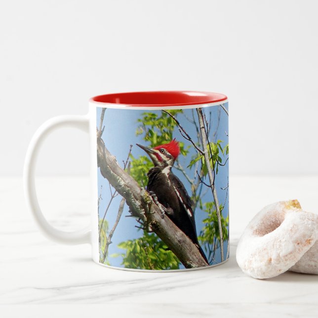 Male Pileated Woodpecker Two-Tone Coffee Mug (With Donut)