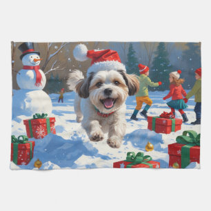 Malti Tzu Running in Snow with Christmas Hat Tea Towel