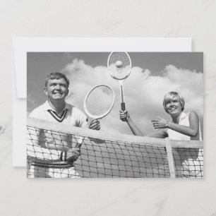 Man and Woman Playing Tennis