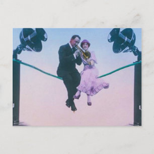 Man and woman sit on telephone wire 1900 postcard