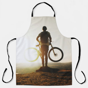 Man carrying bike apron
