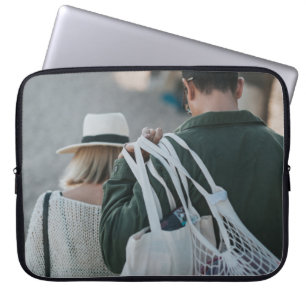 Man carrying white bags