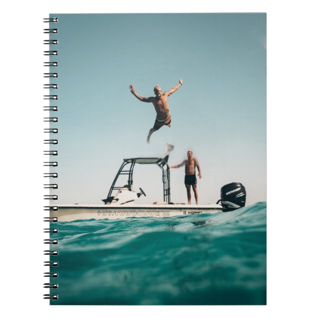 Man diving on pool notebook (Front)