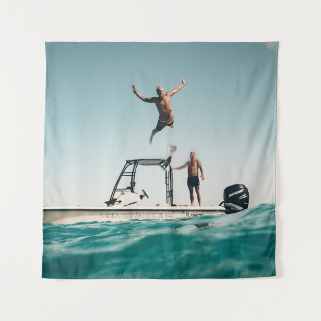 Man diving on pool tapestry (Front)