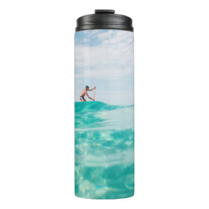 Man doing surfing thermal tumbler