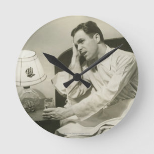 Man Drinking Water Round Clock