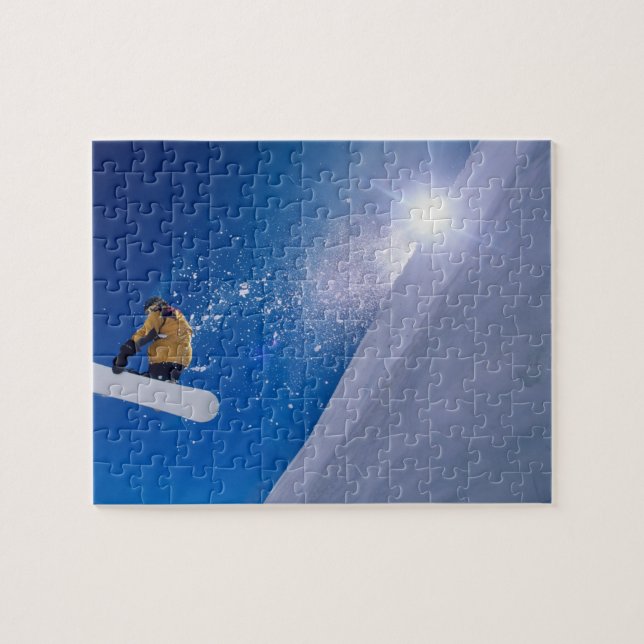 Man flying through the air on a snowboard with jigsaw puzzle (Horizontal)