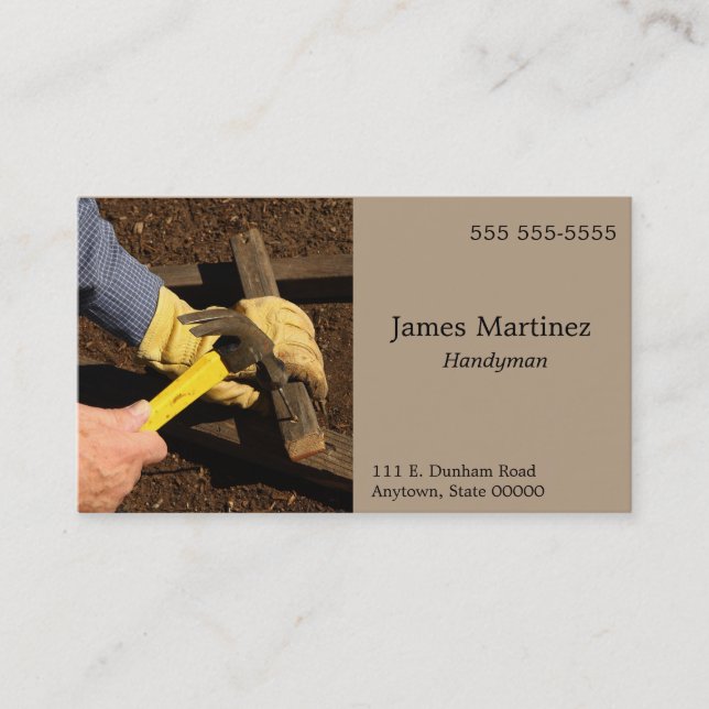 Man hammers wood piece business card (Front)
