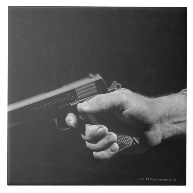 Man Holding Gun Ceramic Tile (Front)