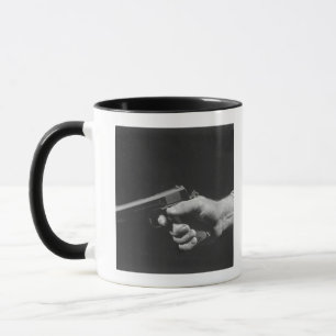 Man Holding Gun Mug