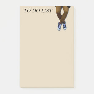 Man Legs Sitting on Tan Notes