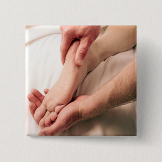 Man Massaging Male Foot 15 Cm Square Badge