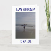 MAN ON BEACH DECLARES HIS LOVE ON ANNIVERSARY