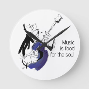 Man playing guitar round clock