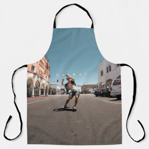 Man playing skateboard apron
