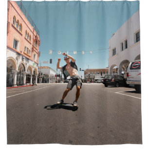 Man playing skateboard shower curtain
