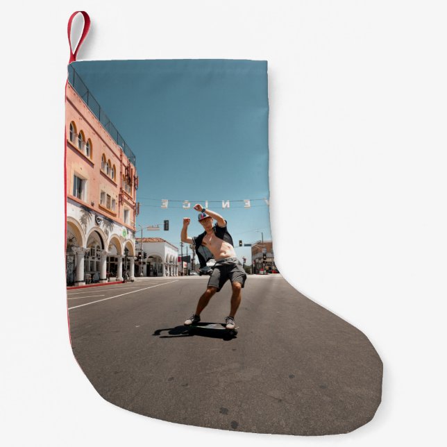 Man playing skateboard small christmas stocking (Front)