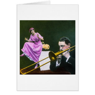 Man plays trombone Flapper  dances on table