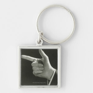 Man Pointing Key Ring