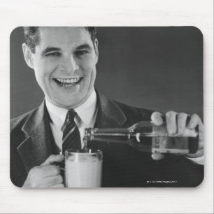 Man pouring beer from bottle to pitcher (B&W), Mouse Pad