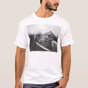 Man Riding Zebra Jumping Fence Photograph T-Shirt