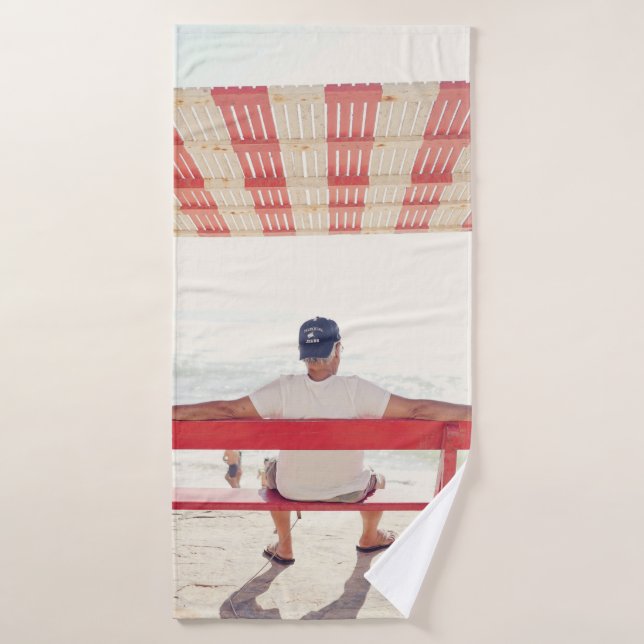 Man sitting on bench near beach bath towel (Bath Towel)