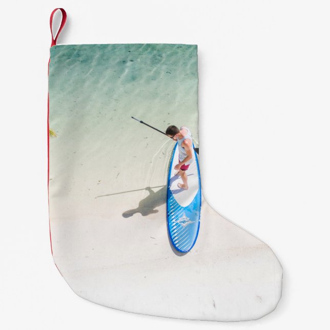 Man surfing on beach small christmas stocking (Front)