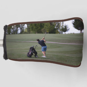 Man swinging a Golf club  Putter Golf Head Cover