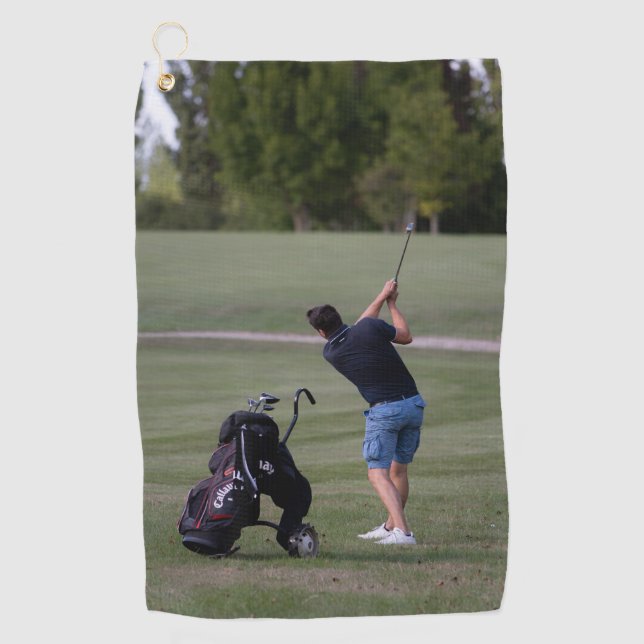 Man swinging a Golf club Towels (Front)