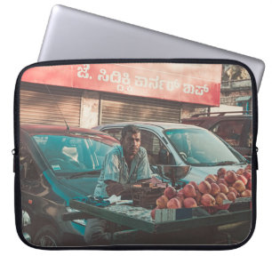 MAN VENDING APPLES NEAR PARKED CARS LAPTOP SLEEVE