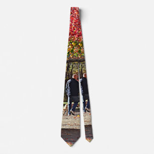 Man Walking Dog in Autumn Park Tie