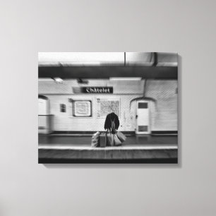 Man with shopping bags in subway (Chatelet) Canvas Print