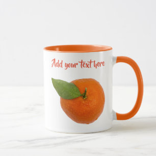 Mandarin with green leaf mug