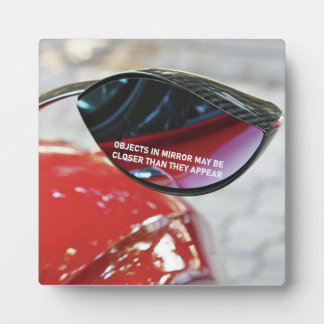 Mandela Effect objects in mirror may be closer Plaque