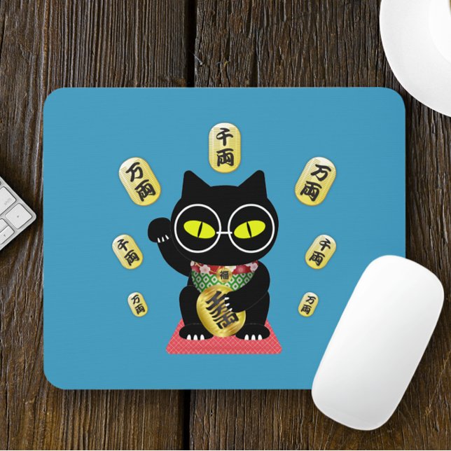 Maneki Neko Lucky Poilue Mouse Pad (A Maneki Neko Lucky Poilue Mouse Pad is on the table.)