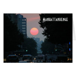 Manhattanhenge: setting pinkish orange sun