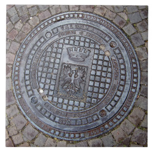 Manhole cover and cobblestone road ceramic tile