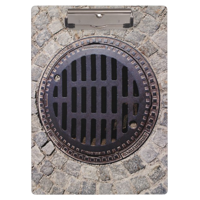 Manhole cover and cobblestone road clipboard (Front)