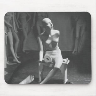 Mannequin with leg and arm removed mouse pad