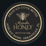 Manuka Honey Black Dark Gold Vintage Bee  Classic Round Sticker<br><div class="desc">Personalise this honey label with your apiary name,  owner name,  net weight and address. Elegant gold script font in the centre spells out "Manuka Honey." Vintage Bee illustration on a black background. Common honey net weight conversions: 8oz (227g),  12oz (340g),  16oz (454g),  32oz (907g),  5lb (2.27kg).</div>