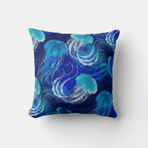Many blue jellyfishes swimming underwater. Seamles Cushion